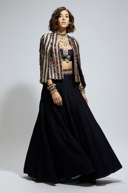 Blue Textured Embellished Cape Jacket Paired with Mask Applique Bustier and Lehenga