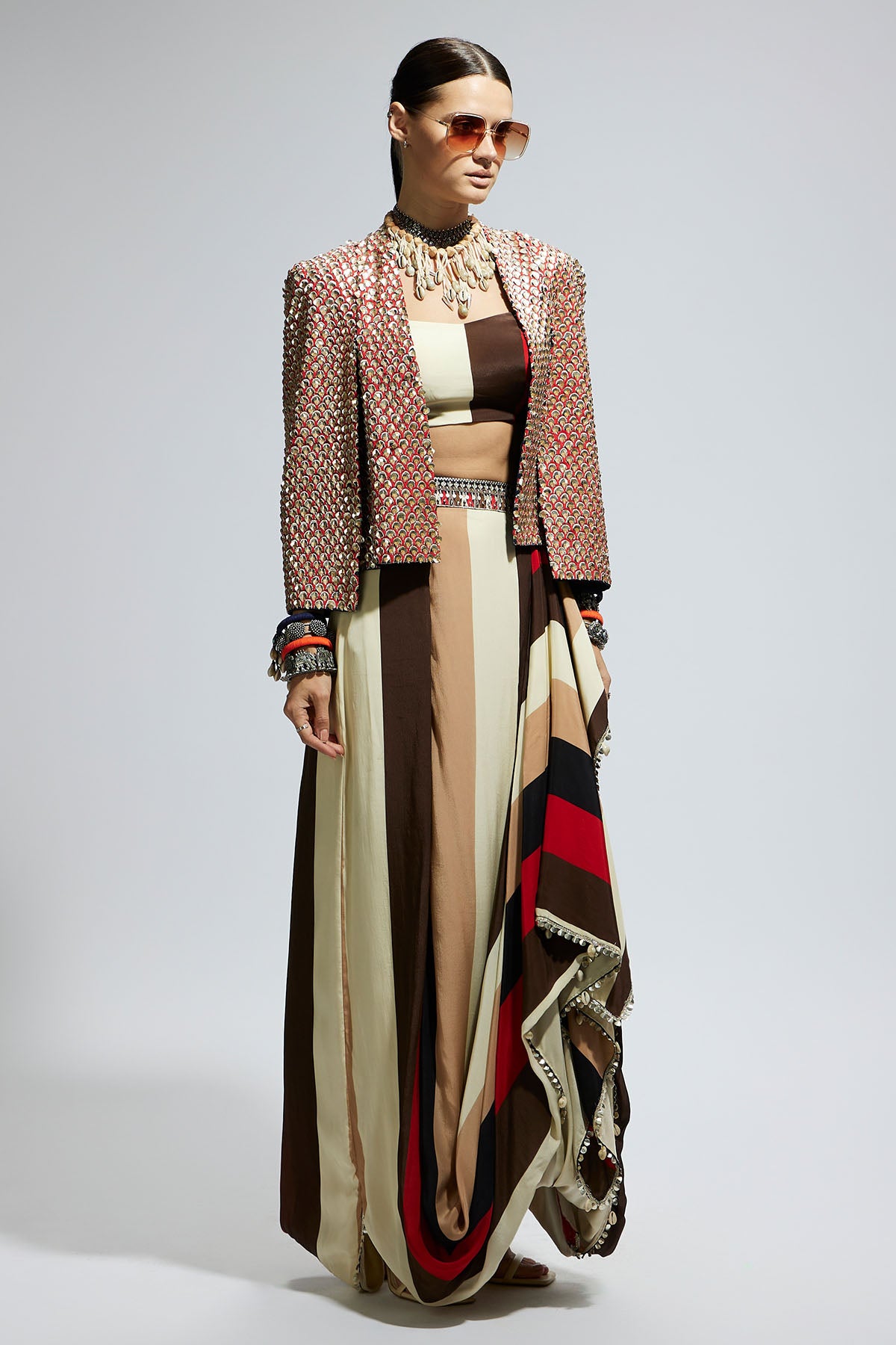 Metallic Embellished Cape Jacket Paired with Stripe Bustier and Stripe Drape Skirt