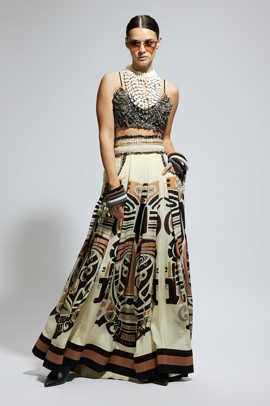 Ivory Mask Printed Box Pleated Skirt with Pockets Teamed with A Textured Bustier