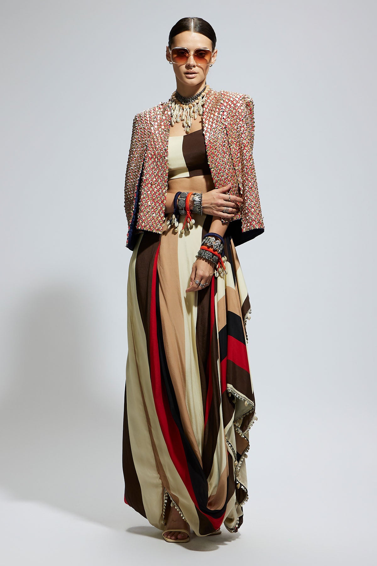 Metallic Embellished Cape Jacket Paired with Stripe Bustier and Stripe Drape Skirt