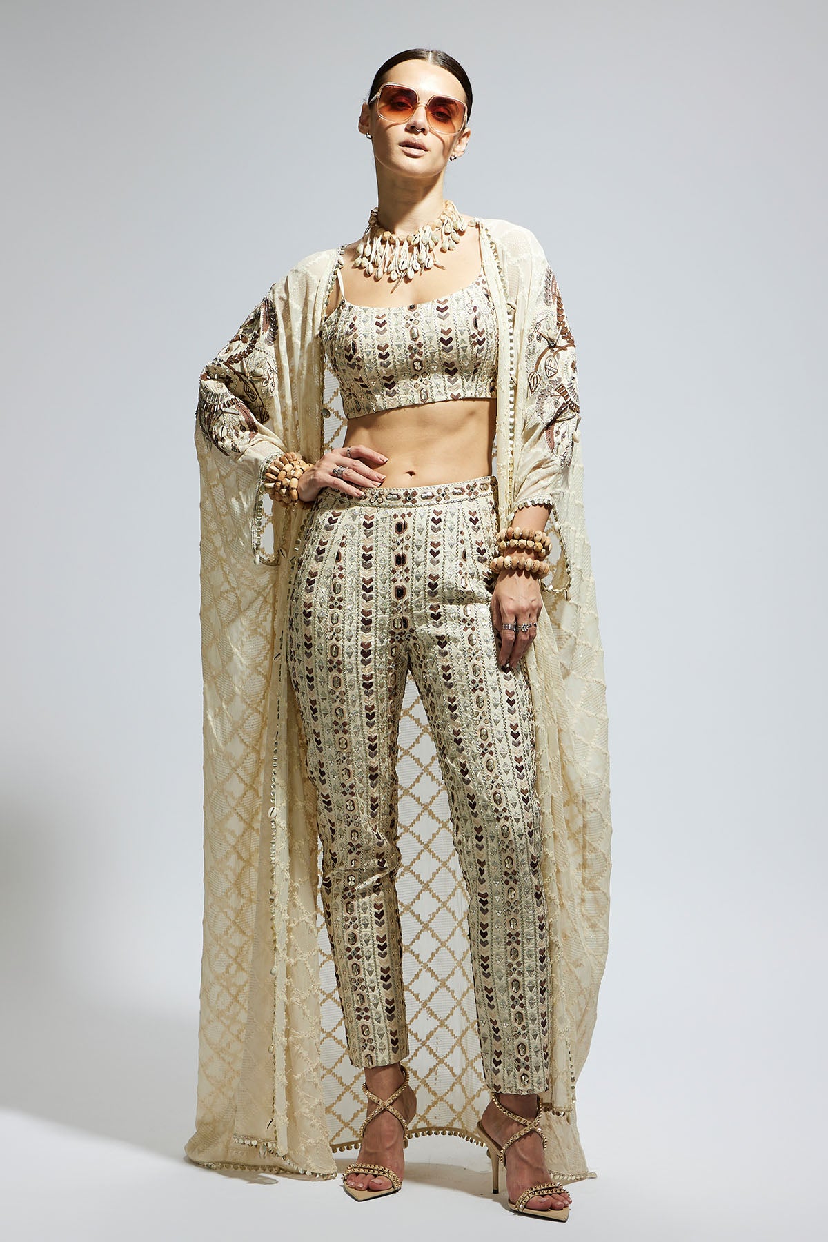 Ivory Aztec Embellished Cape Paired with Heavily Embellished Bustier and Pants