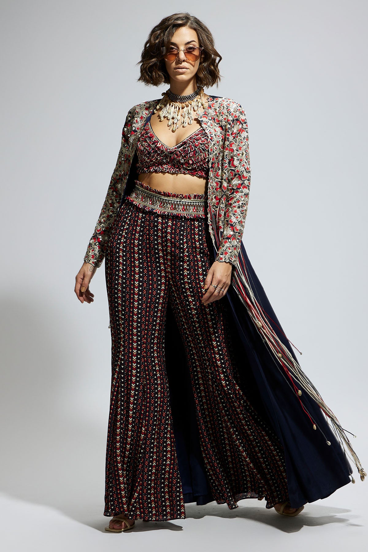 Blue Threadwork Embellished Jacket Paired with Textured Bustier and Blue Printed Sharara Pants