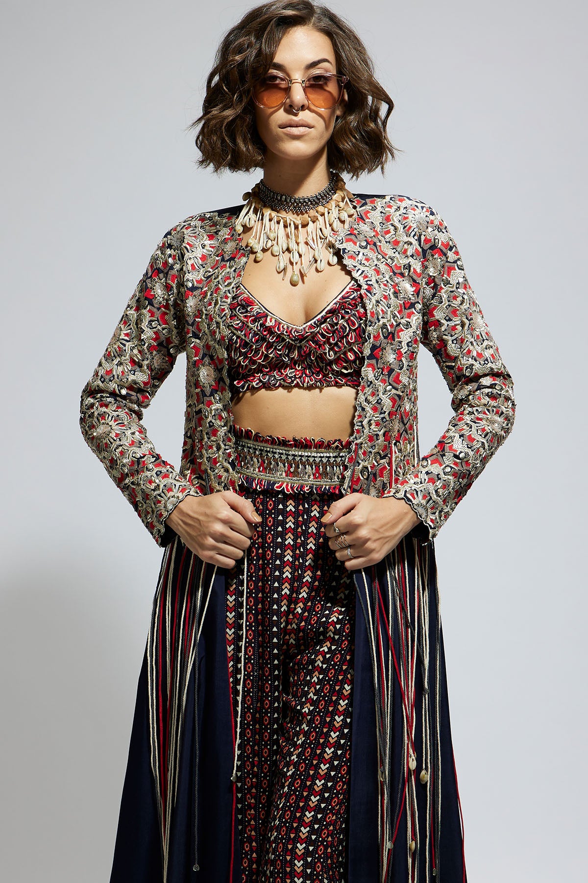 Blue Threadwork Embellished Jacket Paired with Textured Bustier and Blue Printed Sharara Pants