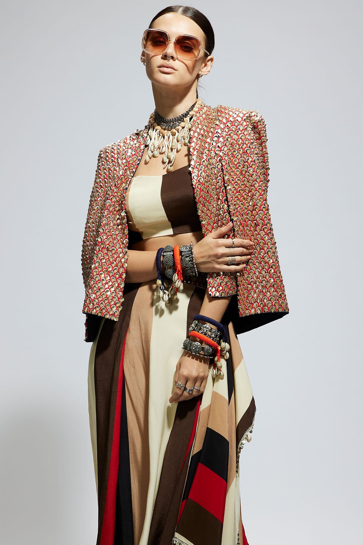 Metallic Embellished Cape Jacket Paired with Stripe Bustier and Stripe Drape Skirt