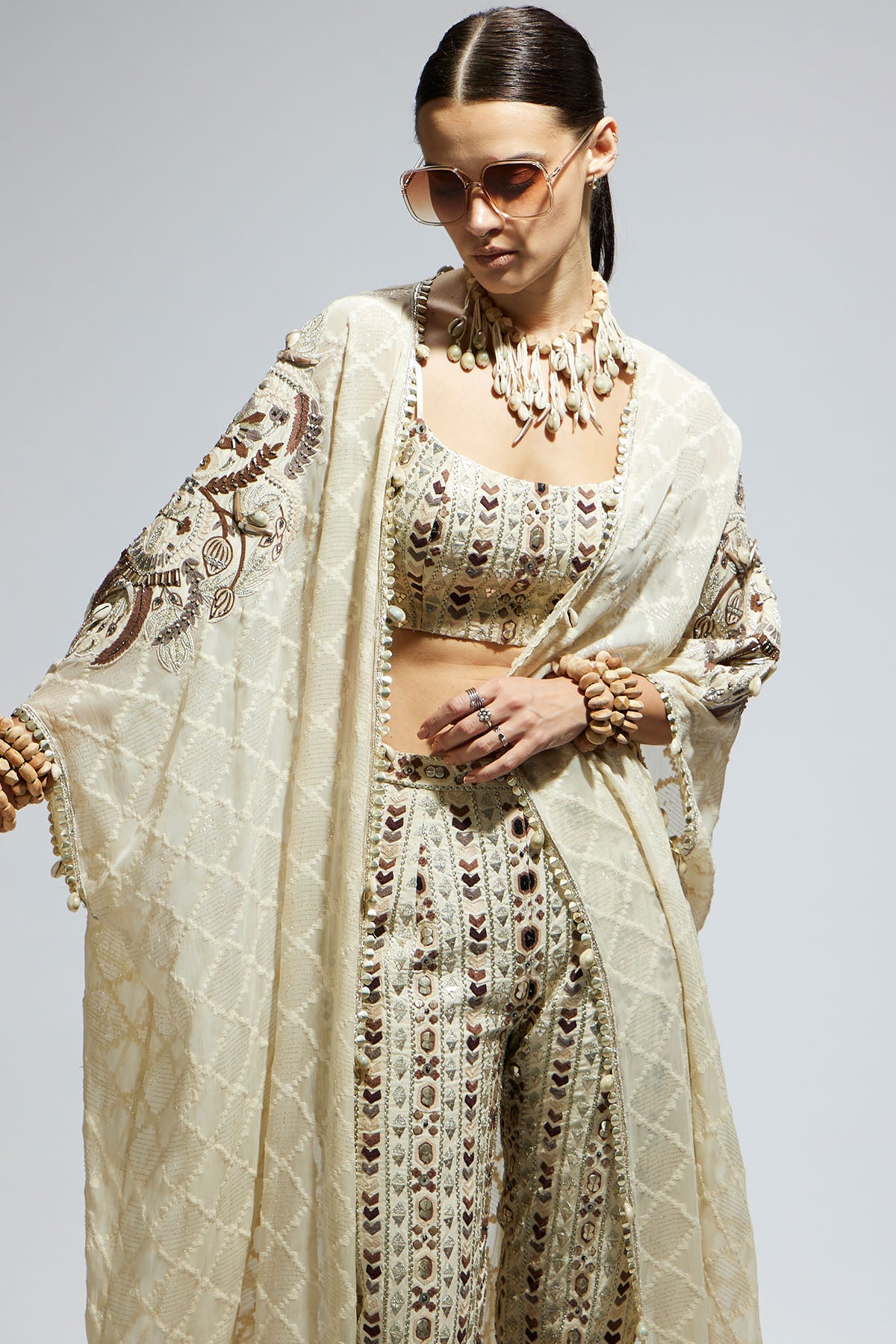 Ivory Aztec Embellished Cape Paired with Heavily Embellished Bustier and Pants