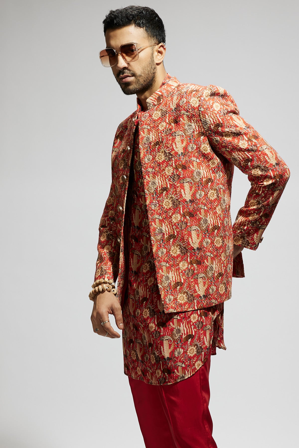 Orange Jaal Embellished Bandhgala Paired With Jaal Kurta And Pants