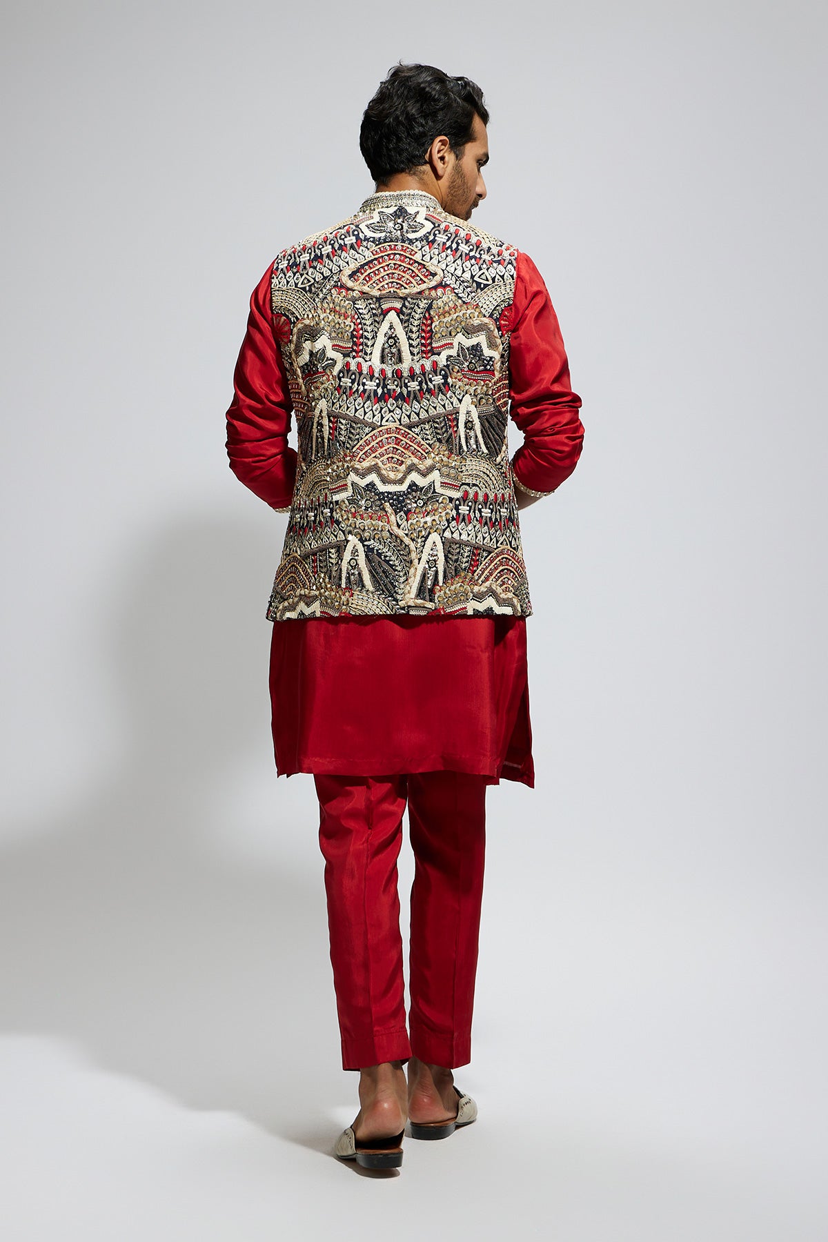 Blue Abtract Embroidered Bundi with Orange Solid Kurta and Pants