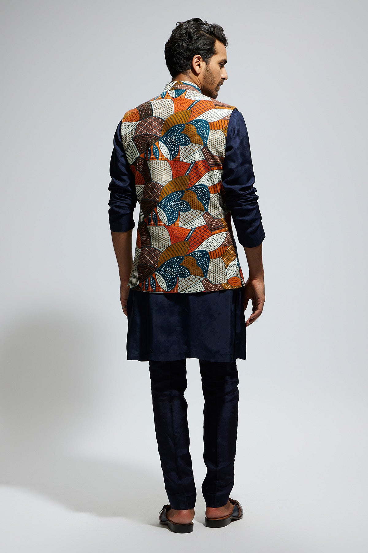 Abstract Bundi Paired With Solid Blue Kurta And Pants