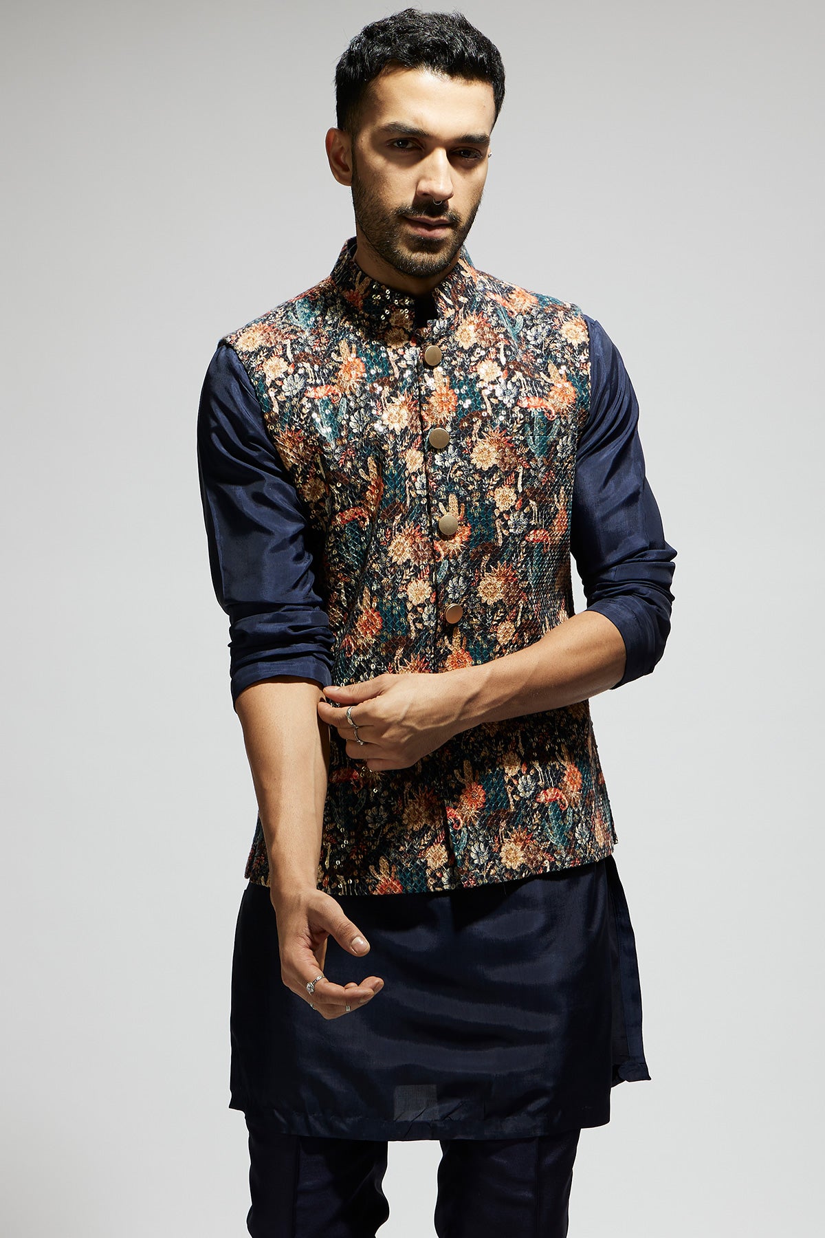 Blue Jaal Embellished Bundi Paired with Solid Blue Kurta and Pants