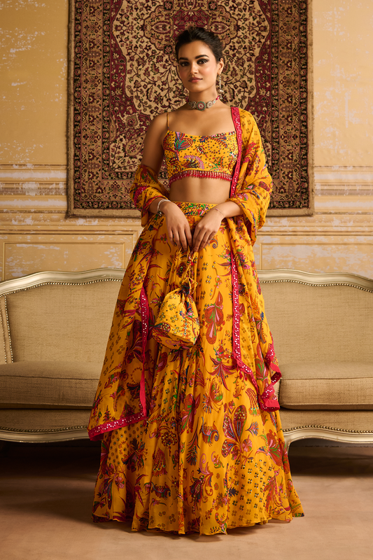 Yellow highlighted blouse and  highlighted lehenga set